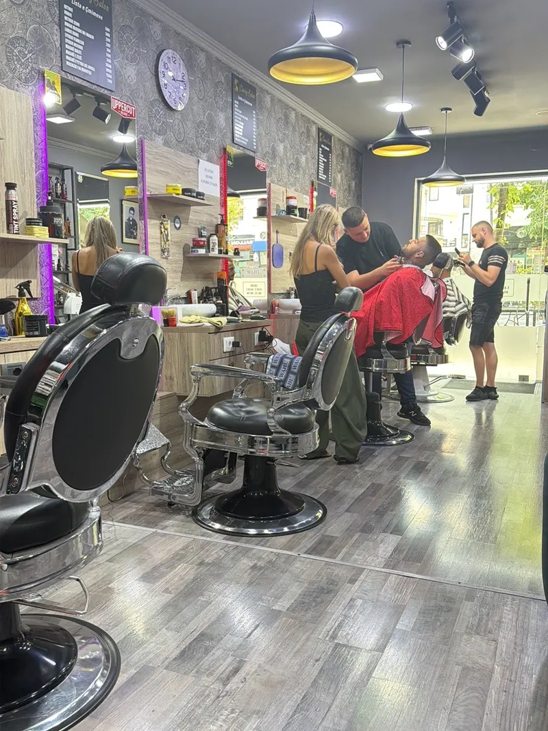 A busy afternoon, barbers at every chair